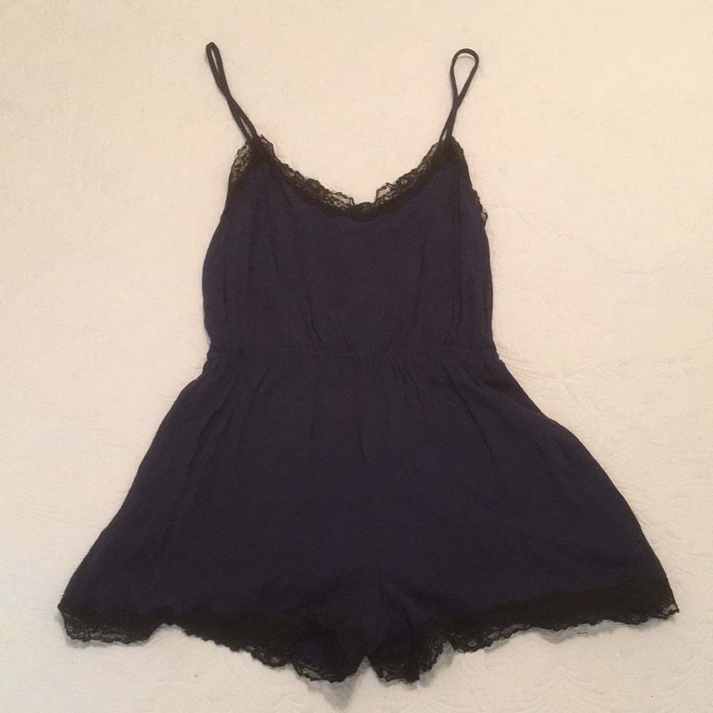 F21 navy romper with black lace trim. Size Medium